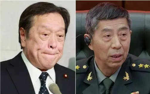  ?? AFP/VNA Photo ?? Japanese Defence Minister Yasukazu Hamada (left) held a 20-minute call with his Chinese counterpar­t Li Shangfu.