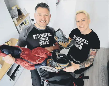  ??  ?? The couple are climbing to Everest base camp to raise funds for Cancer Connection­s.