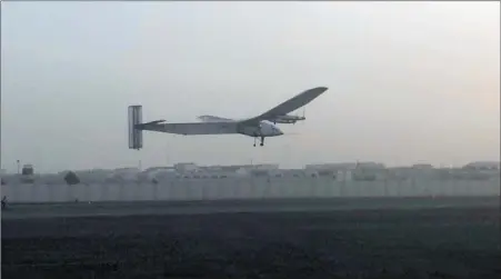  ?? Picture: AP ?? MILESTONE: A Swiss solar-powered plane takes off at an airport in Abu Dhabi, United Arab Emirates, early yesterday, marking the start of the first attempt to fly around the world without a drop of fuel. Solar Impulse founder Andre Borschberg was at the...