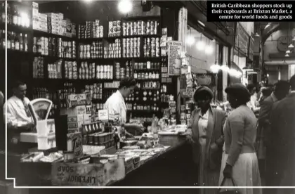  ??  ?? British-caribbean shoppers stock up their cupboards at Brixton Market, a centre for world foods and goods