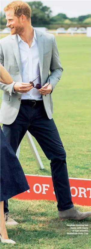  ??  ?? Meghan rocking her heels with Harry at last month’s Sentebale Polo Cup