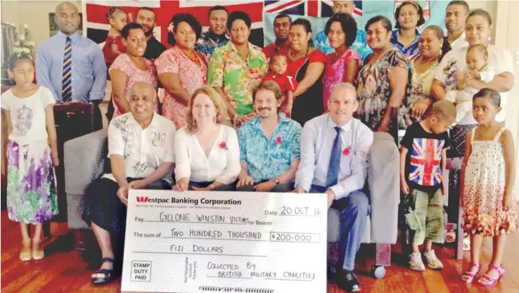  ?? Photo: Selita Bolanavanu­a ?? Sitting from left: Chairman of the Royal British Legion(Fiji Branch) Ratu Meli Vesikula, British High Commission­er to Fiji Melanie Hopkins, her partner, Alessandro Truppia and British Army support officer at the British High Commission Major(Ret’d) Jim...