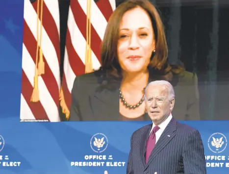  ?? KEVIN LAMARQUE/REUTERS ?? President-elect Joe Biden and Vice President-elect Kamala Harris, appearing behind him via video Wednesday, have been urged by the nation’s top infectious disease expert to swiftly receive the COVID-19 vaccine.