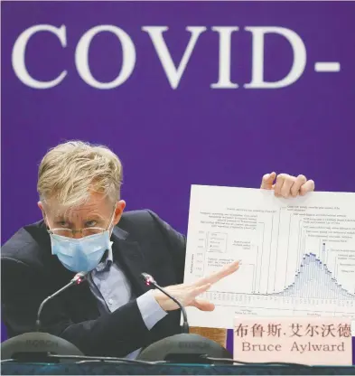  ?? THOMAS PETER / REUTERS FILES ?? Why did Dr. Bruce Aylward, one of the leads on a WHO-China Joint Mission on COVID-19, wear a face mask at a recent
press conference after the WHO said healthy people only need masks if they’re taking care of someone sick?