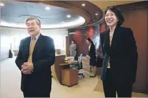  ??  ?? YANG HO CHO, Korean Air chairman, and daughter Heather, executive vice president, at company headquarte­rs in Seoul.