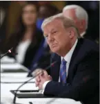  ?? ALEX BRANDON
AP PHOTO/ ?? President Donald Trump listens during a “National Dialogue on Safely Reopening America’s Schools,” event in the East Room of the White House, Tuesday, in Washington.