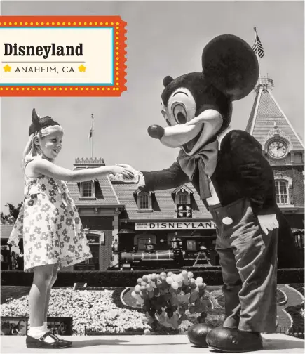  ??  ?? MICKEY MOUSE meets a fan at Disneyland in 1968.