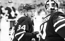  ?? CHRISTOPHE­R KATSAROV THE ASSOCIATED PRESS ?? Toronto Maple Leafs centre Auston Matthews, left, talks with Maple Leafs goaltender Frederik Andersen prior to an NHL hockey game.