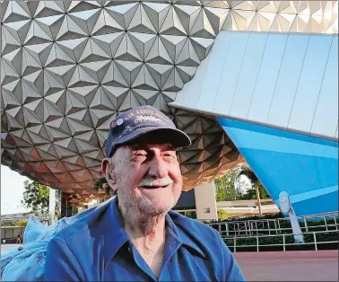  ?? JOE BURBANK/ORLANDO SENTINEL ?? Former Disney constructi­on worker Stephen Nemeth, 94, enjoys a moment on a tour with family and cast members to see some of the attraction­s he helped construct for the 1982 opening of Epcot, at Walt Disney World.