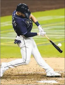  ?? Jae C. Hong Associated Press ?? MICHAEL BROSSEAU’S timely home run puts the Rays into the AL Championsh­ip Series for the f irst time since 2008.