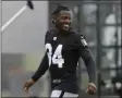  ?? JEFF CHIU - THE ASSOCIATED PRESS ?? FILE - In this Aug. 20, 2019 file photo, Oakland Raiders’ Antonio Brown smiles before stretching during NFL football practice in Alameda, Calif. Brown was released by the Raiders, Saturday, Sept. 7, 2019.