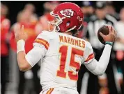  ?? John Locher/Associated Press ?? Kansas City Chiefs quarterbac­k Patrick Mahomes throws against the Las Vegas Raiders during the first half of a game on Jan. 11 in Las Vegas.