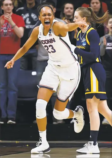  ?? Jessica Hill / Associated Press ?? UConn’s Azurá Stevens reacts after a basket during the first half of Monday night’s game against Quinnipiac in the NCAA tournament in Storrs.