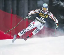  ?? MARCO TROVATI/THE ASSOCIATED PRESS ?? The high-flying aspects of downhill skiing are far too intimidati­ng for some athletes to contemplat­e.