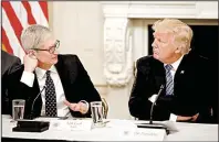 ?? AP/ALEX BRANDON ?? speaks with President Donald Trump at an American Technology Council session in the State Dinning Room of the White House in June.