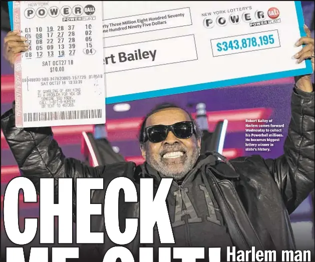  ??  ?? Robert Bailey of Harlem comes forward Wednesday to collect his Powerball millions. He becomes biggest lottery winner in state’s history.