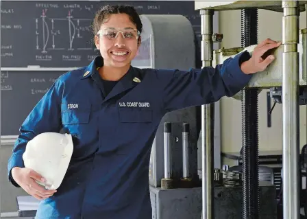  ?? SEAN D. ELLIOT/THE DAY ?? U.S. Coast Guard Academy Cadet 2nd class Kat Stroh stands in one of the engineerin­g labs Thursday in McAllister Hall at the academy. She was recognized as a Modern-Day Technology Leader at the annual Black Engineerin­g of the Year Award’s conference, held virtually Thursday.