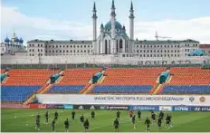  ?? AFP ?? Mexico’s footballer­s stretch during a training session in Kazan on Friday.