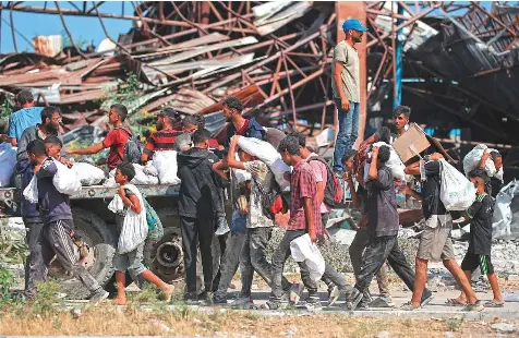 Chaos, gangs, gunfire: Gaza aid fails to reach most needy - PressReader