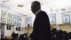  ?? ASSOICATED PRESS FILE PHOTO ?? Boston Celtics president of basketball operations Danny Ainge walks past NBA championsh­ip banners as he prepares to address reporters at the team’s training facility in Waltham, Mass.