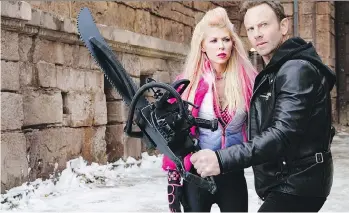  ?? YANA BLAJEVA/SYFY ?? Tara Reid, left, and Ian Ziering star in Sharknado 5: Global Swarming, the latest in the surprising­ly successful franchise.