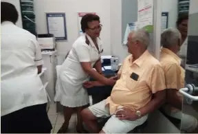  ??  ?? Sister Davids testing a patient’s blood pressure.