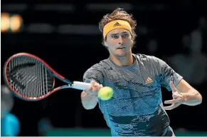  ?? AP ?? Germany’s Alexander Zverev returns to Russia’s Daniil Medvedev during the win that took him into the ATP semifinals.