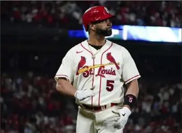  ?? The Associated Press ?? Albert Pujols looks at the scoreboard after being replaced by a pinch-runner in the eighth inning of Game 2, the final appearance in his legendary career.