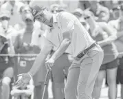  ?? Ray Carlin / Fort Worth Star-Telegram ?? Jordan Spieth tries to coax his putt into the hole on the ninth green during the second round of the Dean & DeLuca Invitation­al at Colonial in Fort Worth.