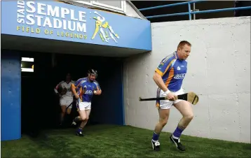  ??  ?? Carnew’s Joe Murphy (seen here taking to the field in Semple Stadium for Wicklow) bagged five points and led the way in their victory over Glenealy in the opening round of the SHC in 2000.