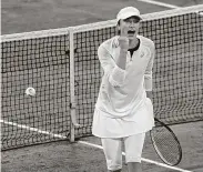  ?? Alessandra Tarantino / Associated Press ?? Iga Swiatek, another 19-year-old, celebrates a win as her opponent Simona Halep's return falls short.