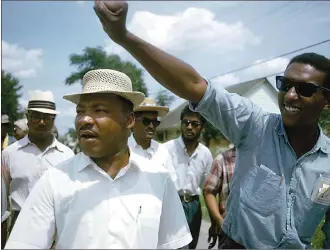  ?? Associated Press photo ?? This 1966 image released by HBO shows Dr. Martin Luther King, Jr., left, and Stokely Carmichael in Jackson, Miss., at the Meredith March, used in the documentar­y “King in the Wilderness.”