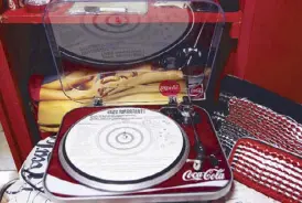  ??  ?? Let the music play on: Coca-Cola turntable