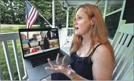  ?? KIRK MCKOY Los Angeles Times ?? WENDY BOHON, shown in Maryland on a Zoom call with relatives in Virginia, said the death of George Floyd led to weeks of family discussion­s about racism.