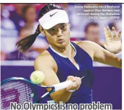  ?? – AFPPIX ?? Emma Raducanu hits a forehand
against Elise Mertens (not pictured) during the Mubadala
Citi DC Open.