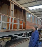  ?? ?? LNERCA founder and vice-chairman Murray Brown inspects the partially stripped framework of TTO No. 23956.