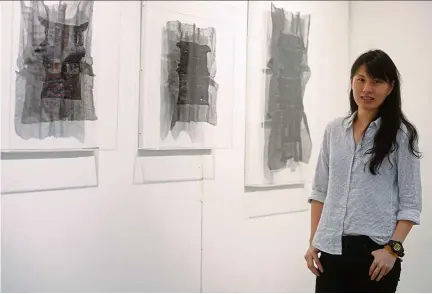  ??  ?? Artist Yim says her delicate gauze creations are ‘fragments of memories’. — Photos: SIA HONG KIAU/ TheStar