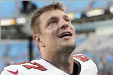  ?? ?? The Canadian Press
Tampa Bay Buccaneers tight end Rob Gronkowski leaves field after their win against the Carolina Panthers in an NFL football game Dec. 26, in Charlotte, N.C.