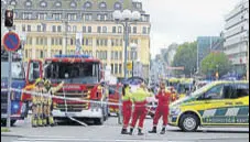  ?? AFP ?? Police and first responders in Turku on Friday.