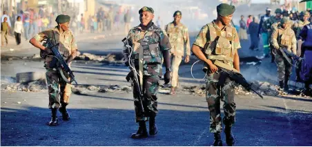  ?? PICTURE: AYANDA NDAMANE/ANA ?? TIME WARP? Soldiers on patrol in Samora Machel. Deploying the army to fight gangs is a bad idea, says the writer.