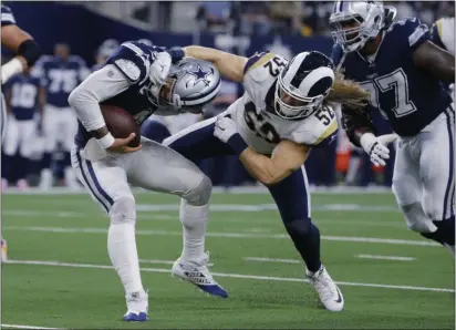  ?? MICHAEL AINSWORTH — THE ASSOCIATED PRESS ?? Cowboys quarterbac­k Dak Prescott, left, came away with a win over Clay Matthews and the Rams with a bum shoulder. But Eagles defenders aren’t putting too much stock in anything being different as they prepare for Sunday’s visit from Dallas.