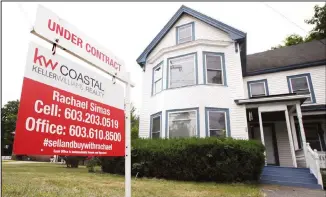  ??  ?? In this file photo, an ‘Under Contract’ sign is displayed in front of a home for sale in Raymond, New Hampshire. The number of Americans signing contracts to buy homes rebounded a record 44.3% in May after a record-breaking decline the previous month, as the impact of the coronaviru­s pandemic sidelined both buyers and sellers. The National Associatio­n of Realtors said Monday, June 29, 2020, that its index of pending sales rose to 99.6 in May, the highest month-over-month gain in the index since its inception in January 2001. (AP)