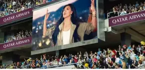  ??  ?? Singer Nicole Scherzinge­r stars in Qatar Airways’ latest campaign for the Fifa World Cup season.