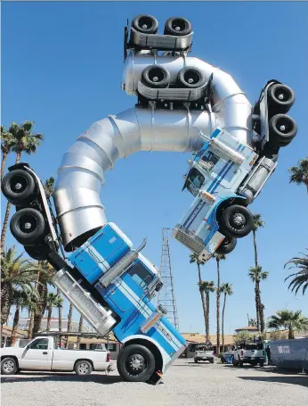  ??  ?? Tanker trucks dance in Big Rig Jig, by Mike Ross, installed for the Life is Beautiful festival. RUSS PETERS