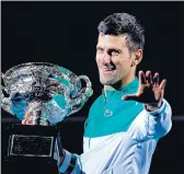  ?? MACKENZIE SWEETNAM/TNS ?? Novak Djokovic celebrates after his victory in the Australian Open men's final. It is his 9th Austrailia­n Open title and 18th Grand Slam title overall.