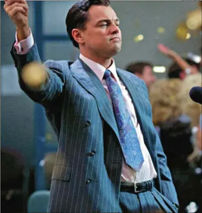  ?? PHOTO: IMAGE.NET ?? Gold finger: Leonardo DiCaprio raising his game as Jordan Belfort in Martin Scorsese’s film