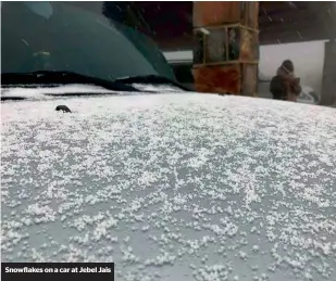  ??  ?? Snowflakes on a car at Jebel Jais