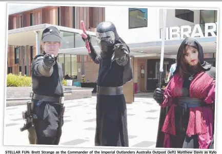  ?? Picture: Bev Lacey ?? STELLAR FUN: Brett Strange as the Commander of the Imperial Outlanders Australia Outpost (left) Matthew Davis as Kylo Ren and Sarah Minazzo as Darth Naga. Head to the Toowoomba City Library in your best sci-fi cosplay outfits for an action-packed day of all things sci-fi and Star Wars at Galactic Fest.