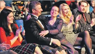  ??  ?? Carol MacLean from Tobermory and Hector Mackechnie from Savary, Lochaline, celebrate their huge achievemen­t in winning the Gold Medals at the Royal National Mòd.