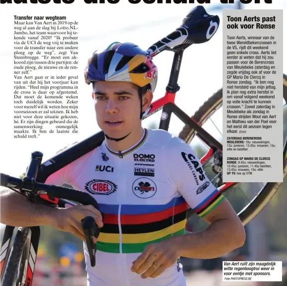  ?? Foto PHOTOPRESS.BE ?? Van Aert ruilt zijn maagdelijk witte regenboogt­rui weer in voor eentje met sponsors.